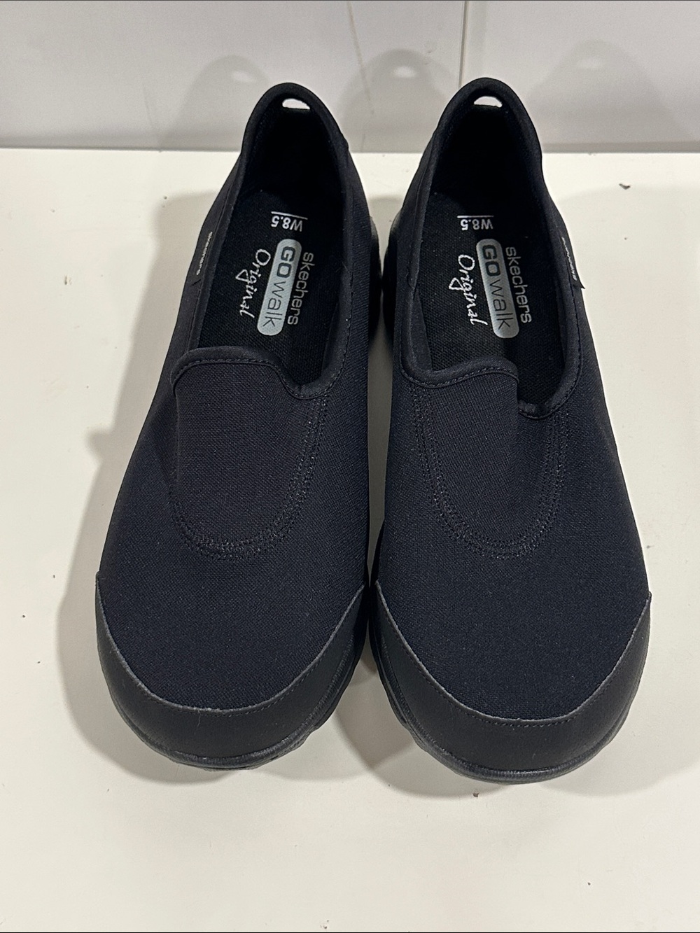 Skechers women’s Black Slip-On GOwalk Sneakers size W 8.5